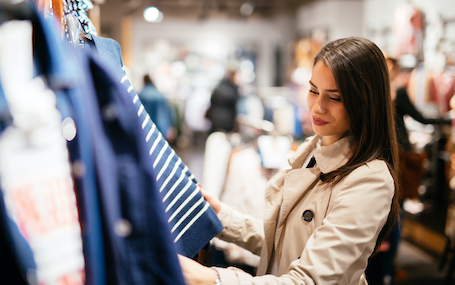 Woman shopping, We make tradeoffs when making everyday decisions.